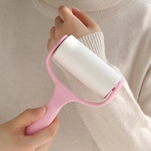 Cây lăn dính bụi quần áo- có sẵn 1 cuộn giấy