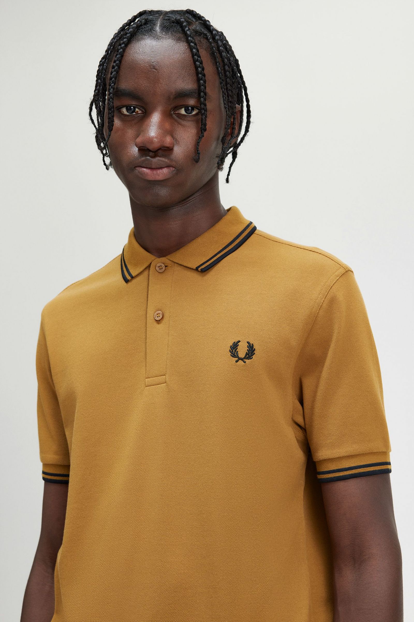 black and yellow fred perry polo shirt