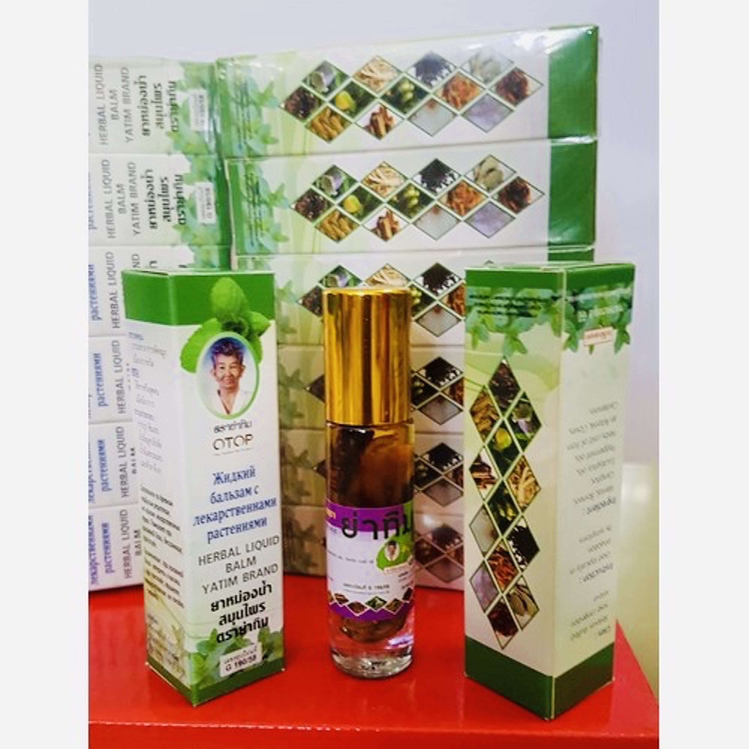 Dầu lăn thảo mộc bà già 13 vị otop 8ml thái lan