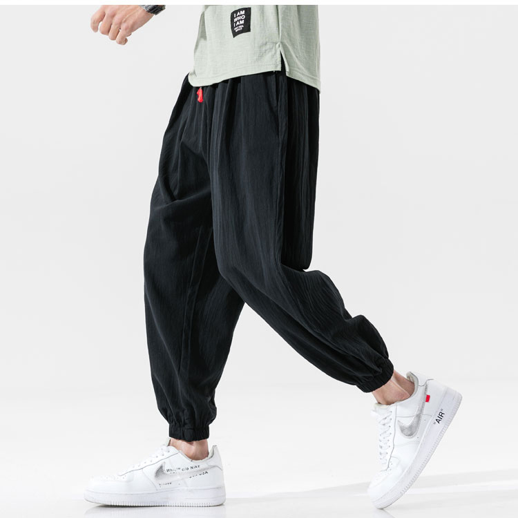 Quần dài nam jogger trơn bo ống chất liệu thô đũi