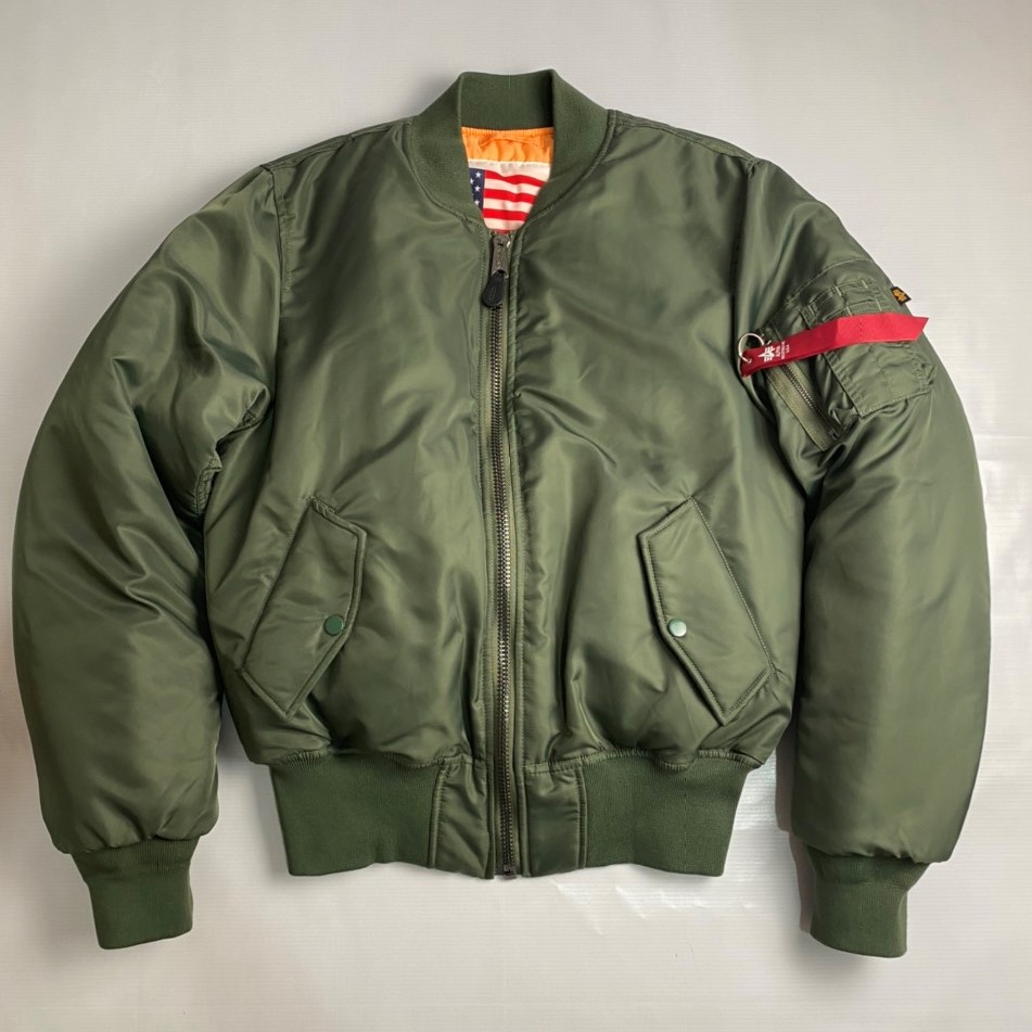 Áo pilot phiên bản cờ Mỹ in lời thề 12 ngôn ngữ - phụ kiện Alpha industries