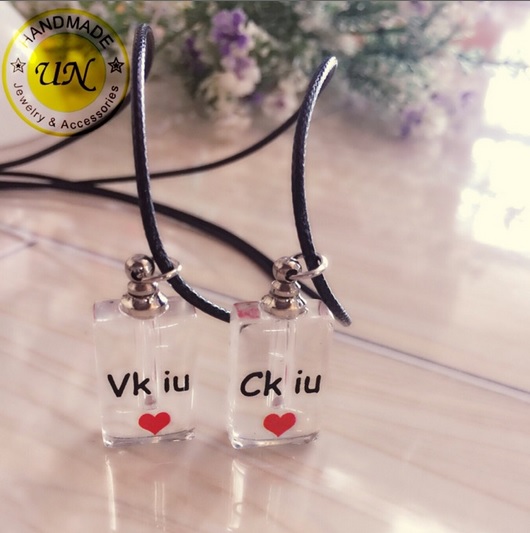 Dây chuyền cặp khắc tên hạt gạo theo yêu cầu
