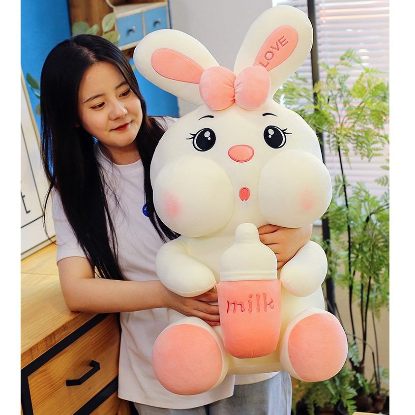 Gấu bông thỏ ôm bình sữa 4 size
