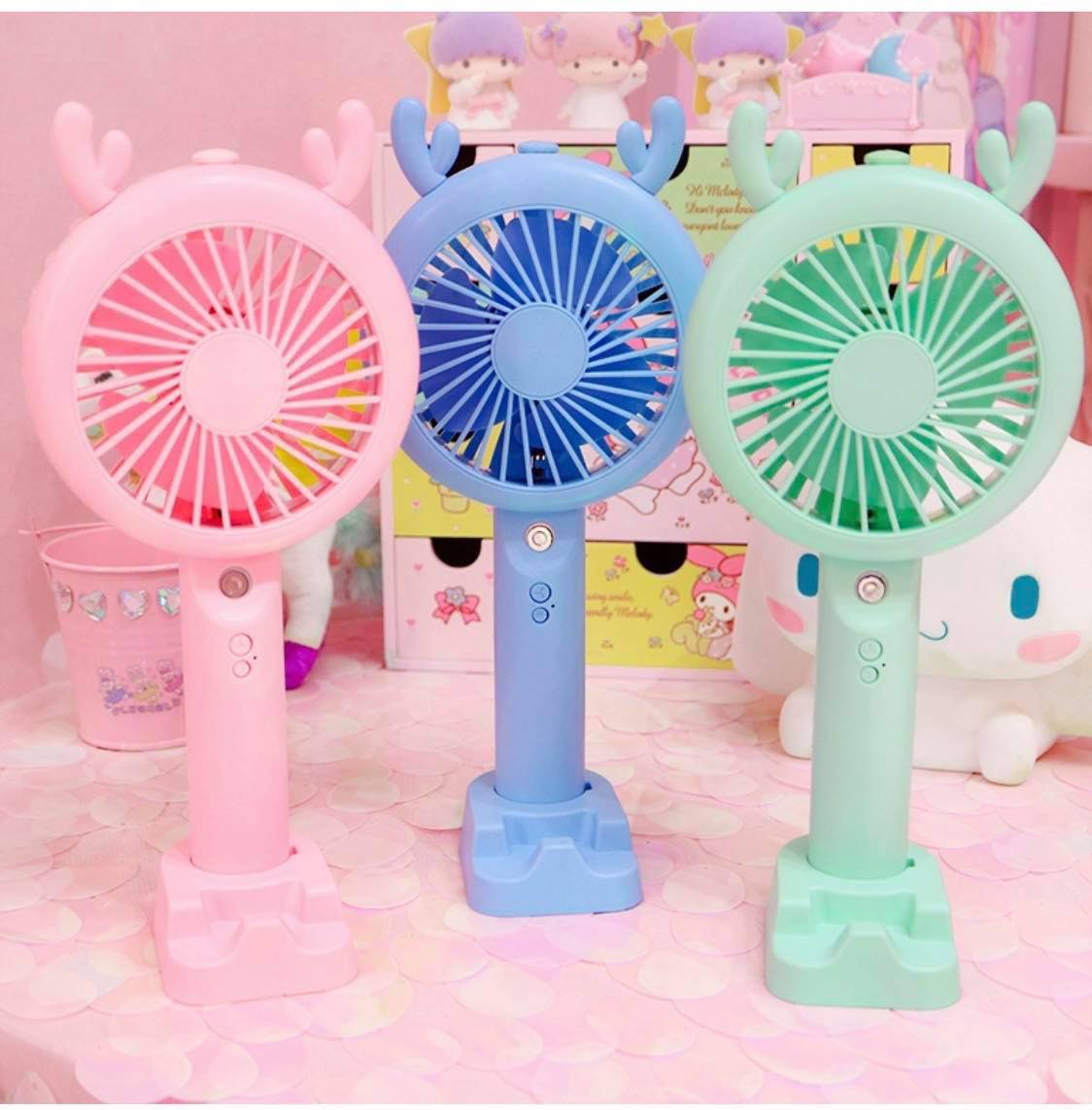 Quạt mini cầm tay phun sương tự động
