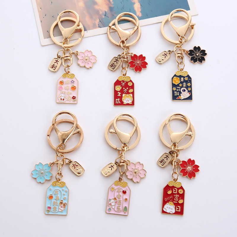 Móc khóa omamori may mắn bằng kim loại nhiều ý nghĩa