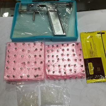 Combo dụng cụ bấm lỗ tai +đinh +nút