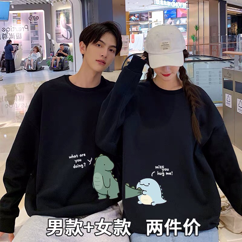 Áo đôi sweater khủng long cắn đuôi
