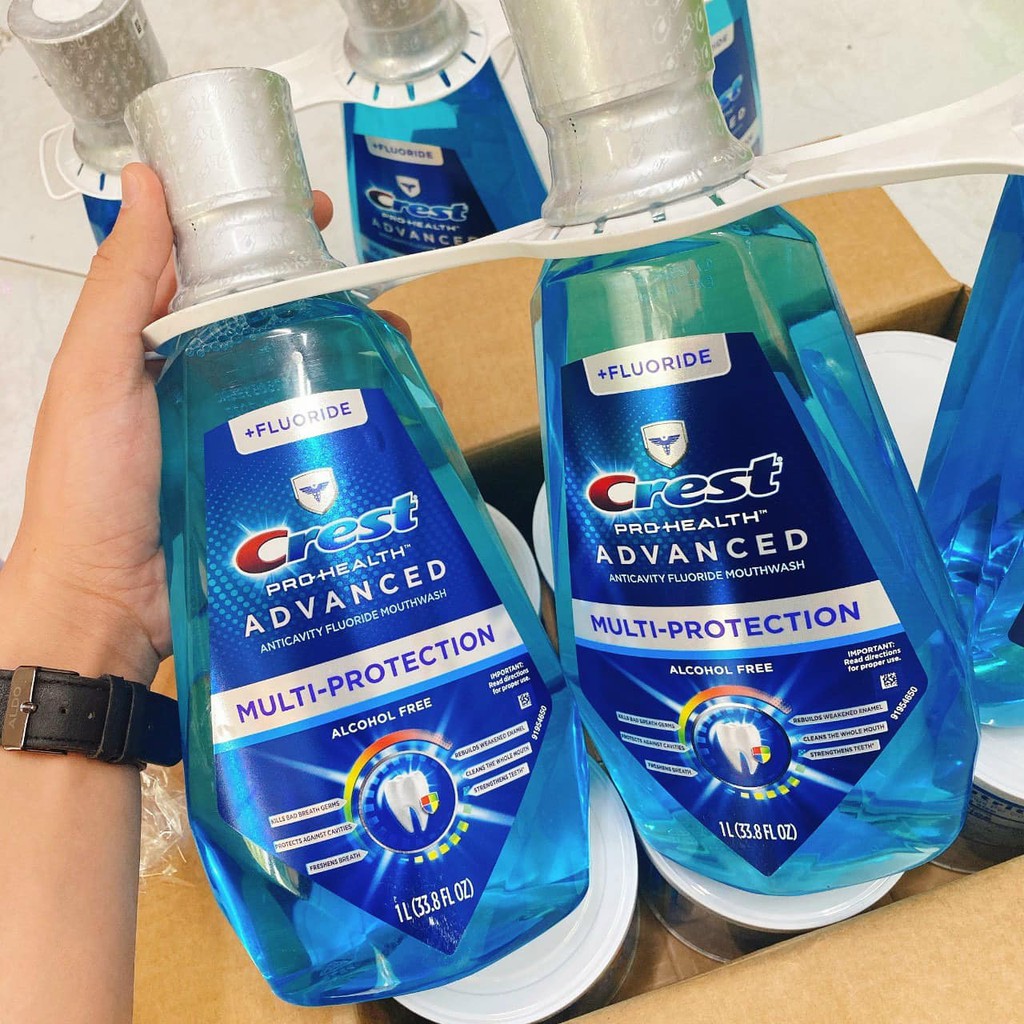 Nước súc miệng Trắng răng Crest Brilliance 3D White 1L màu xanh