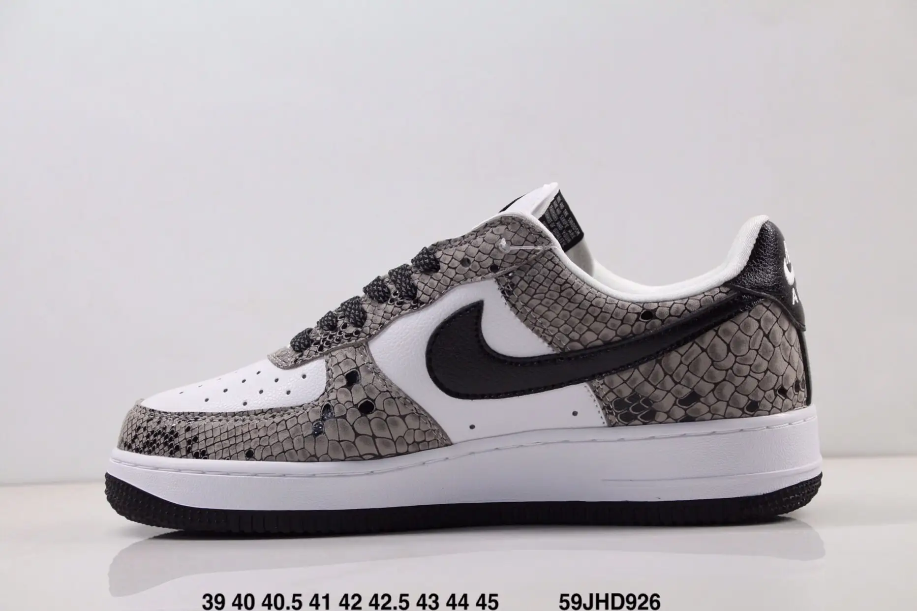 nike air force 1 trainers in white snakeskin trim