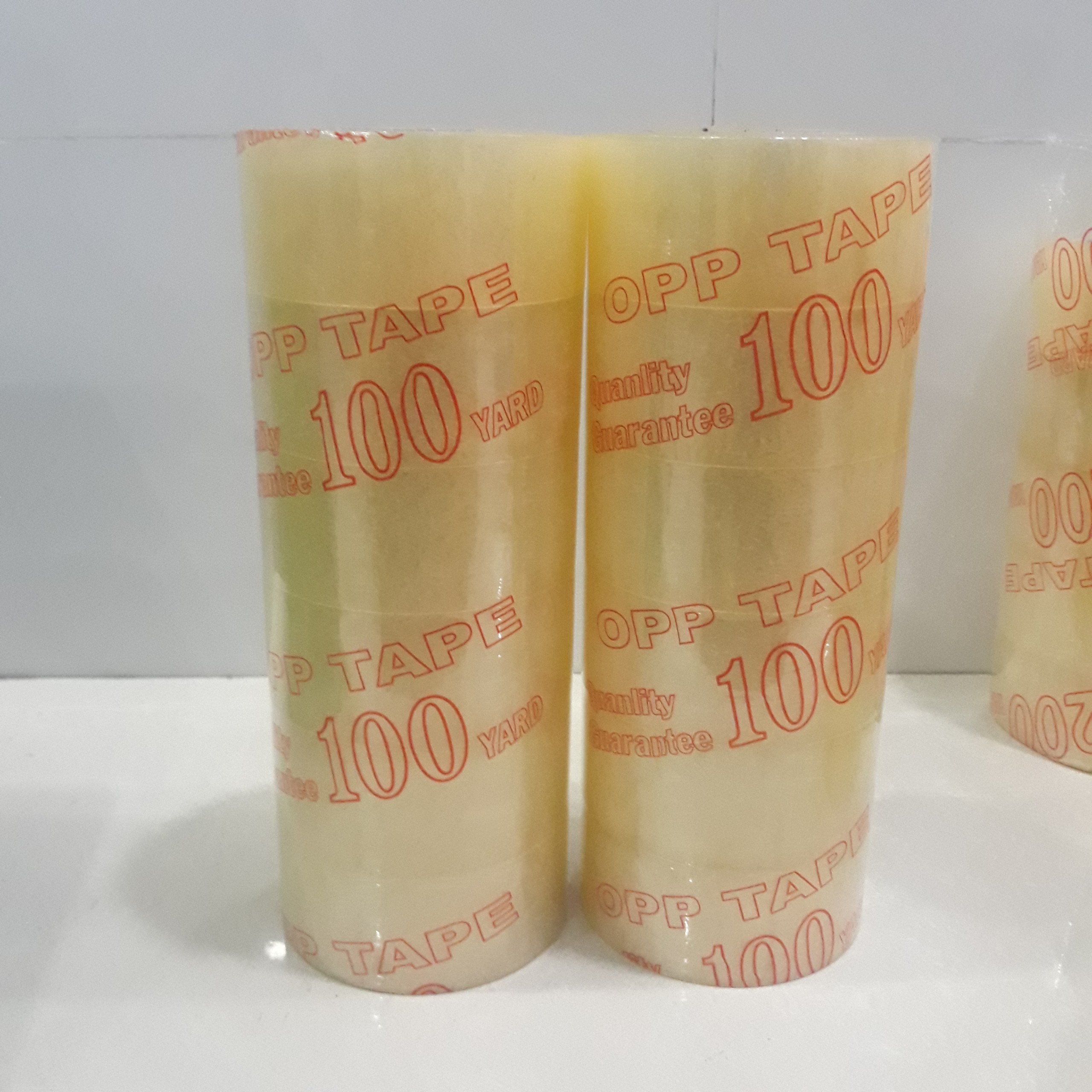Cây băng keo dán thùng 100y 1.1kg, keo dán đóng hàng siêu bền 100y 1.1kg, băng dính dán thung carton 100y 1.1kg