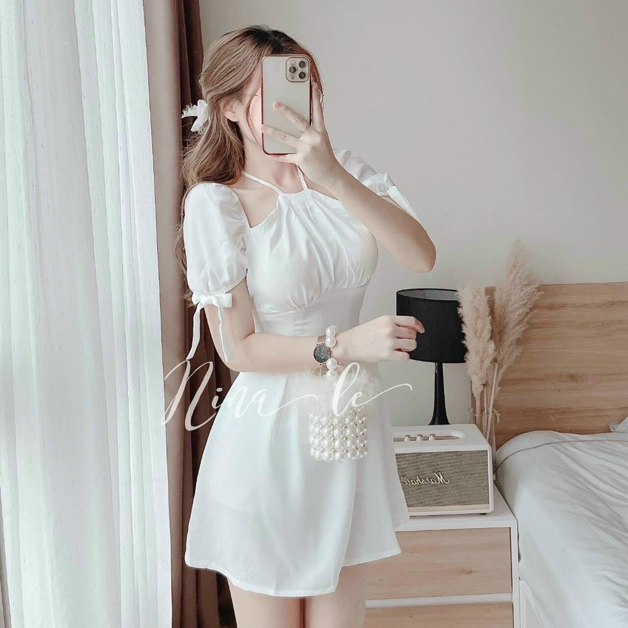 Đầm nữ dáng xòe tay cột nơ thiết kế cổ yếm sang chảnh
