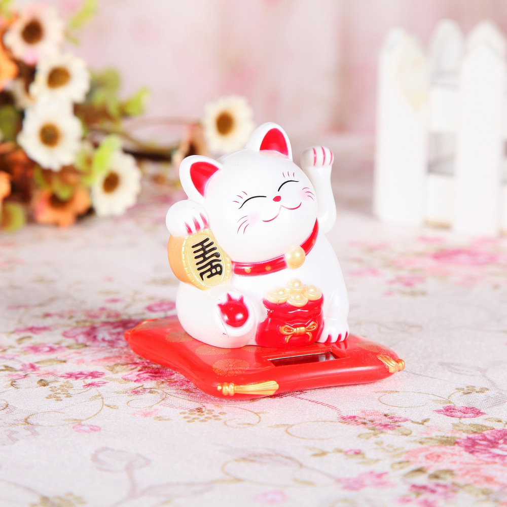 Tượng mèo vẩy tay tự động là biểu tượng của may mắn, chiêu tài, phát lộc