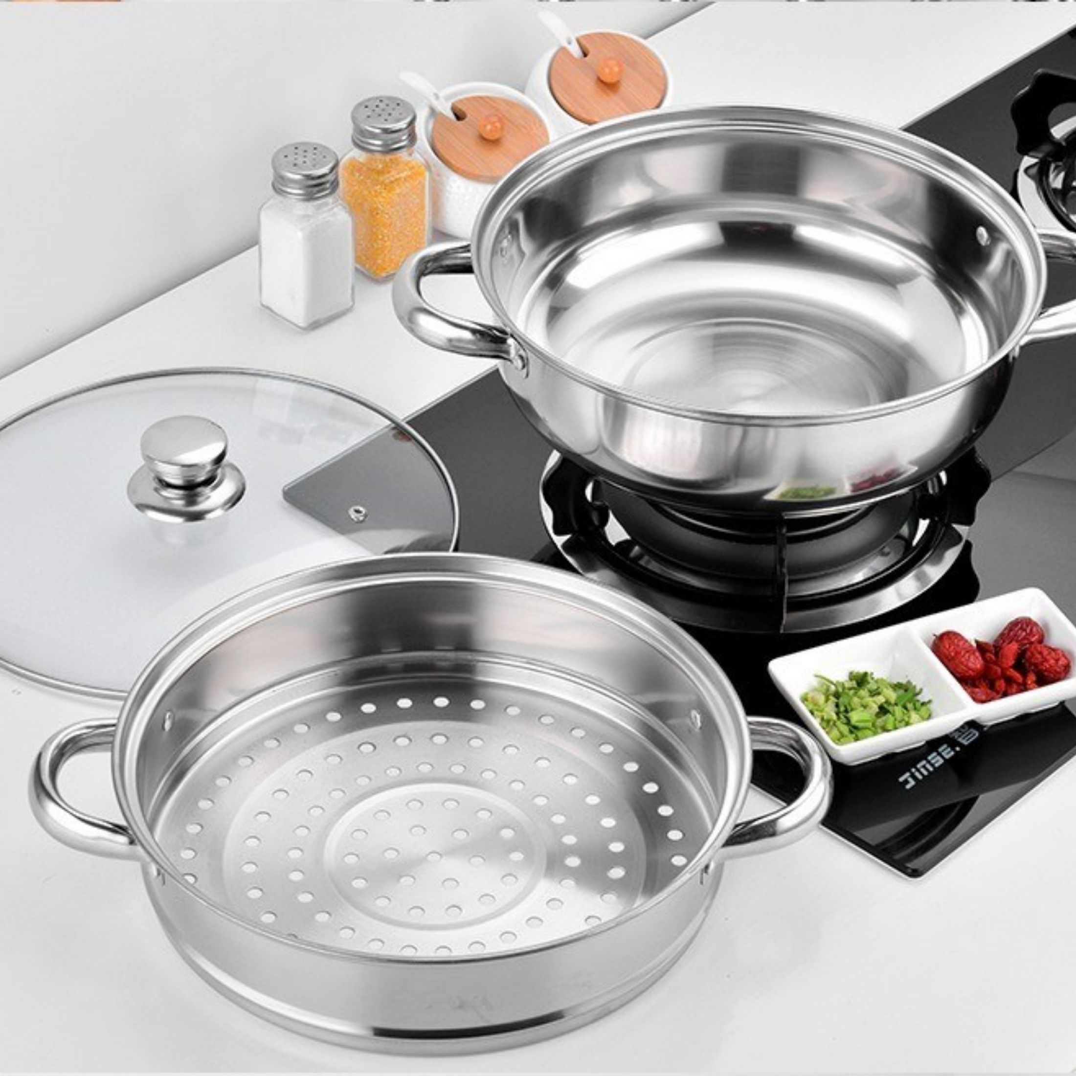 Xửng hấp 2 tầng 28cm-Nồi hấp 28cm inox sáng bóng giá rẻ. nắp bằng kính có lỗ thông hơi dễ dàng cho việc nấu nướng.