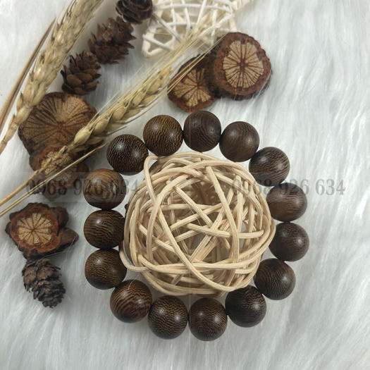 Vòng đeo tay hạt gỗ mun vân lông công - Chuỗi đeo tay gỗ mun 12 ly - Vòng phong thủy mang lại bình an và may mắn
