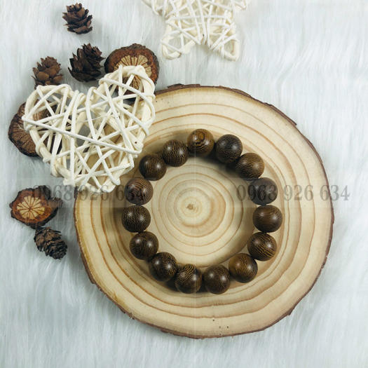 Vòng đeo tay hạt gỗ mun vân lông công - Chuỗi đeo tay gỗ mun 12 ly - Vòng phong thủy mang lại bình an và may mắn