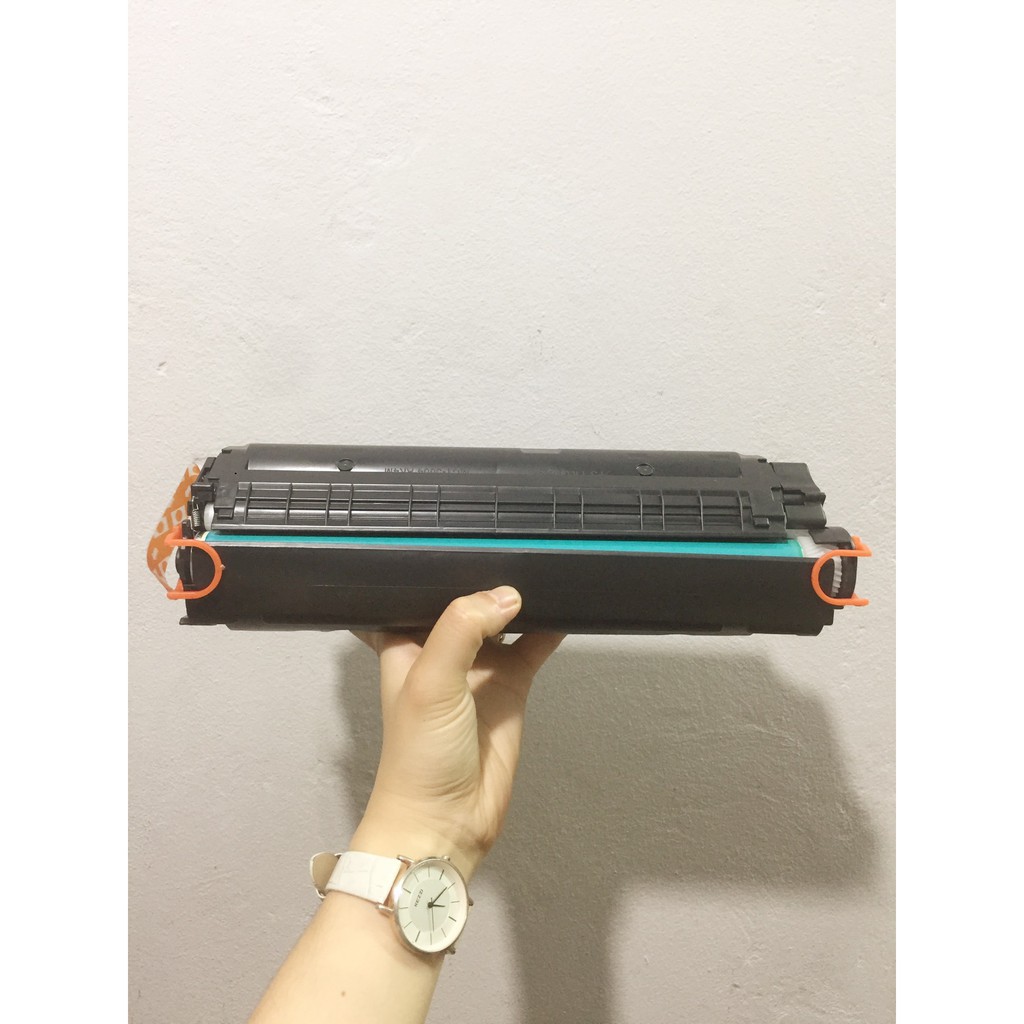 Hộp mực 12a dùng cho máy in canon 2900 có lỗ đổ mực và lỗ đổ mực thải bên ngoài