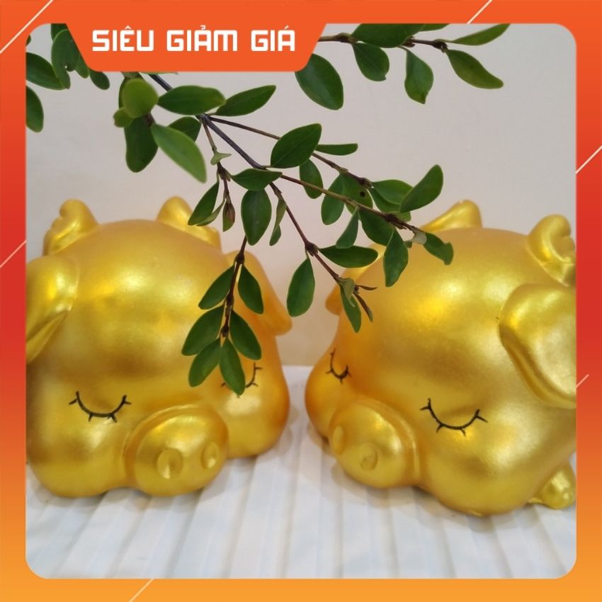 Heo đất lợn vàng thạch cao tiết kiệm ống tiết kiệm heo có cánh thiên thần đáng yêu