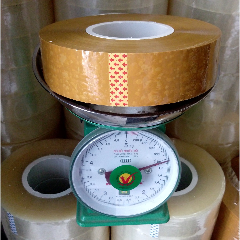 Băng dính 1kg lõi 3ly, 4ly, 5ly màu vàng đục, màu vàng cam trắng