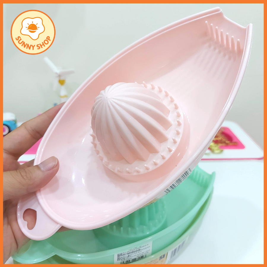 Dụng cụ vắt cam nhựa