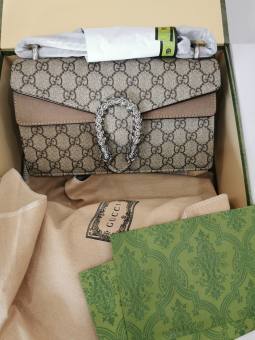 Túi xách đầu rồng gucci