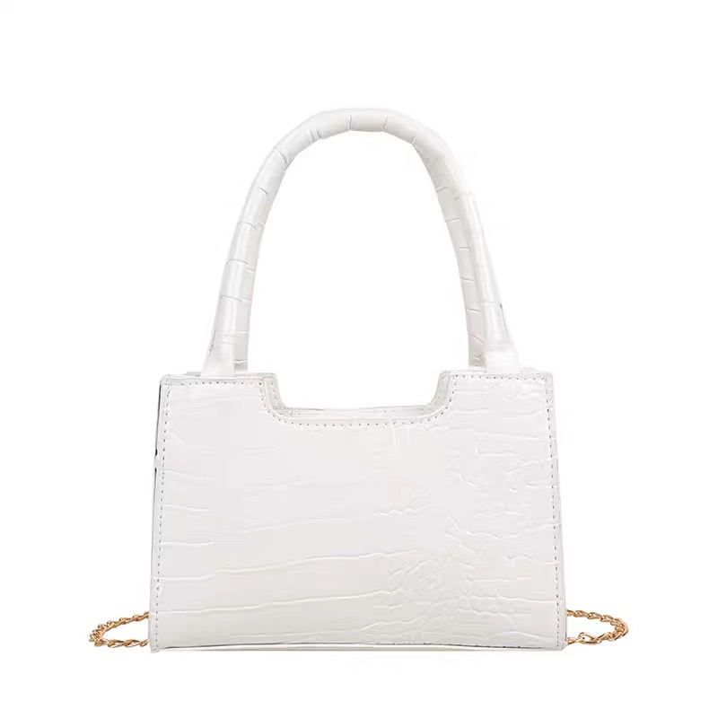 White on sale crocodile handbag