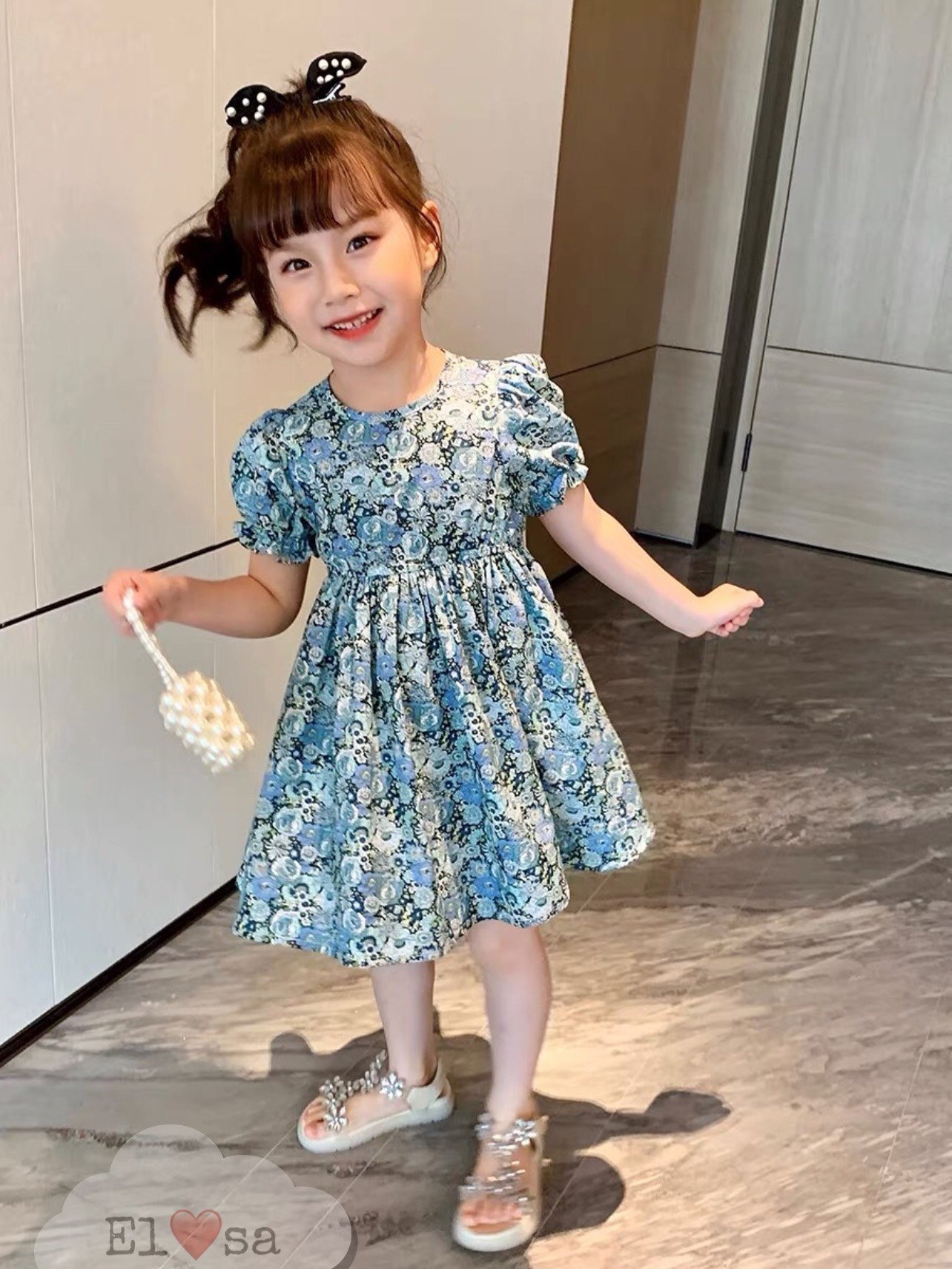 Váy thô hoa nhí tim tím cho bé