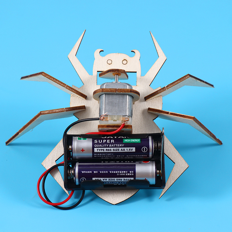 Electric spider robots assembling wooden material kit handmade science