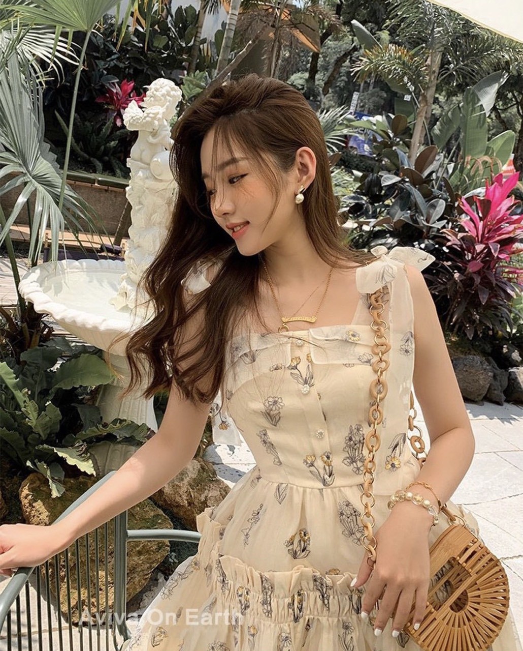 Đầm 2 dây hoa cột vai bèo tầng.