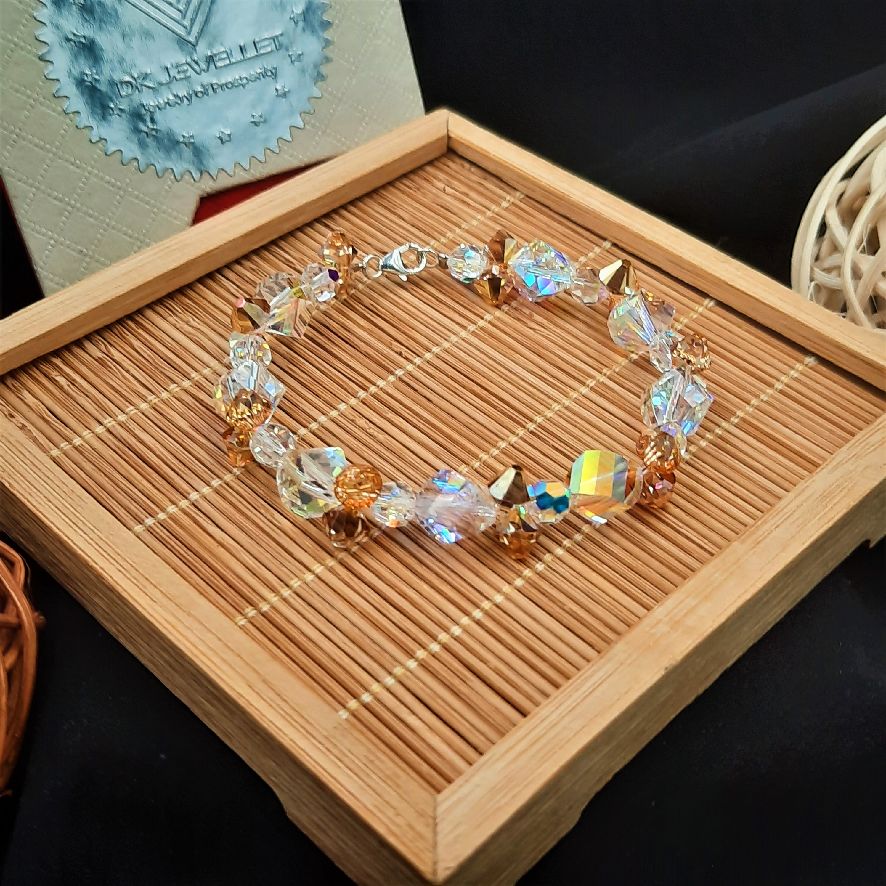 Lắc tay pha lê Swarovski khối lập phương trắng mix vàng ánh kim