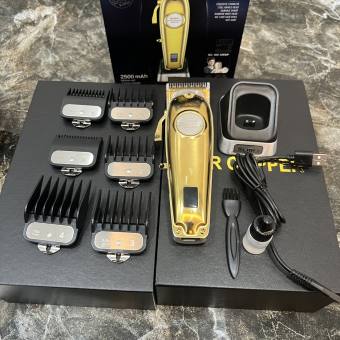 Tông đơ cắt tóc Kemei KM-K53S sử dụng đế sạc và đèn LED hiển thị pin