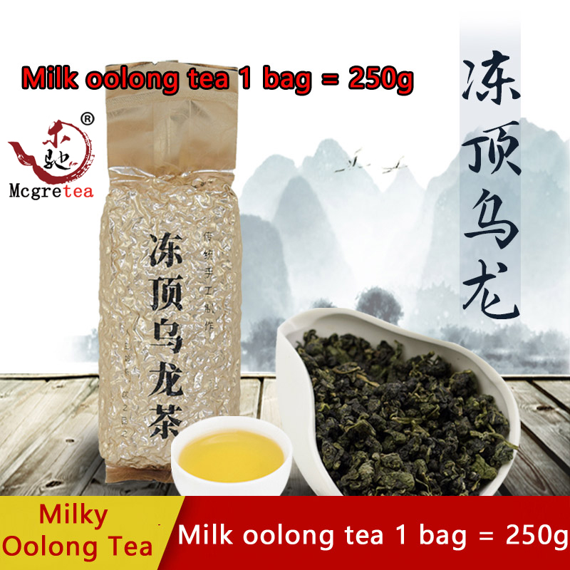 Gambar 2022 Musim Bunga Teh Berkualiti Tinggi Taiwan Susu Berperisa Beku Atas Teh Oolong 250G 500G Alpine Tradisional Tangan Dibuat Kuat Rasa Oolong