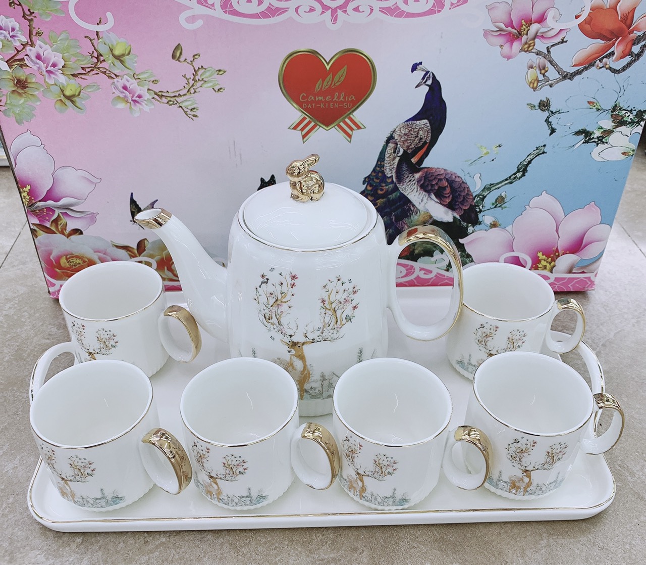 Bộ ấm chén kèm khay sứ pha trà trắng họa tiết hươu rừng