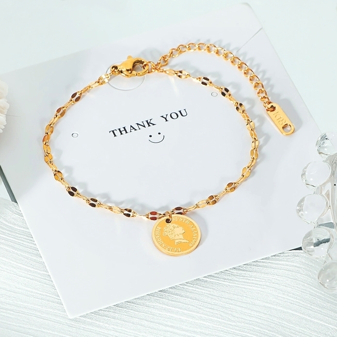 Lắc tay titan nữ không gỉ mặt tròn đồng xu khắc hình nữ hoàng