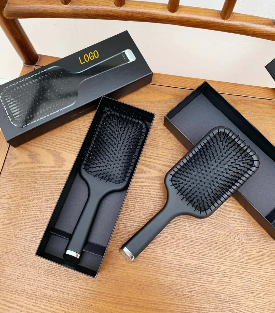 Lược gỡ rối, mát xa đầu tiện dụng siêu xịn ghd