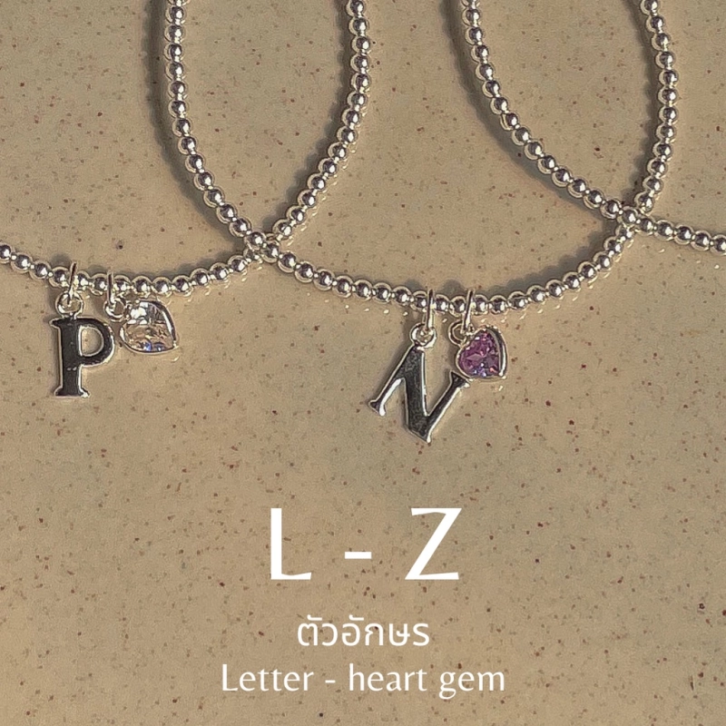 ภาพหน้าปกสินค้าSissyJewelry // ข้อมือเงินแท้ รุ่นเอ็นยืด จี้ตัวอักษร (L-Z) + จี้หัวใจ (sizeแจ้งที่แชท) Free gift box จากร้าน Sissy Jewelry บน Lazada