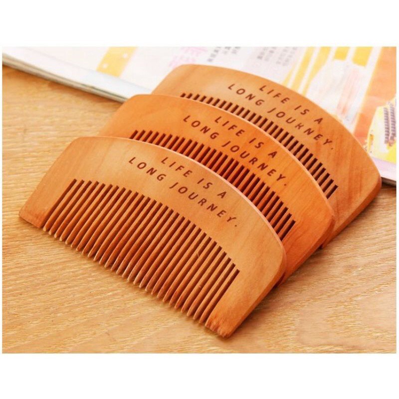 Lược chải tóc bằng gỗ massage đầu