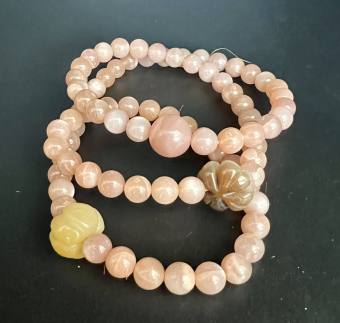 Vòng tàu cuấn 3 vòng đá mặt trời phối cỏ 4 lá Ngọc Cẩm huyết A.