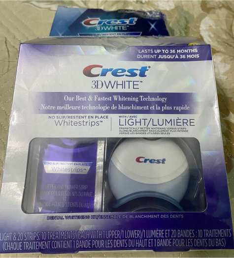 Bộ Sản Phẩm Tẩy Trắng Răng Miếng Dán Crest 3D White Với Đèn