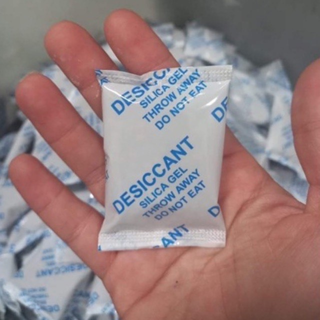 Gói Hút Ẩm 1KG quy cách 30GR/gói Silicagel - hạt hút ẩm quần áo giày dép máy ảnh