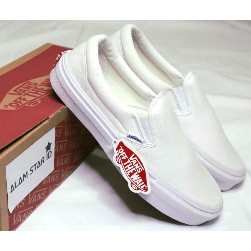 All white leather hot sale slip on vans