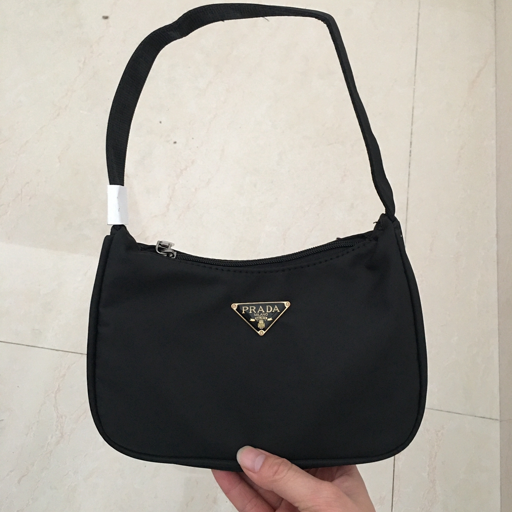 prada sling bag woman