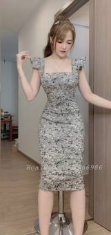 Đầm body hai dây họa tiết hoa lá dài qua gối